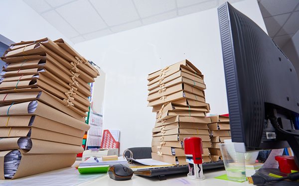 How to Reduce Paper Waste In Your Office